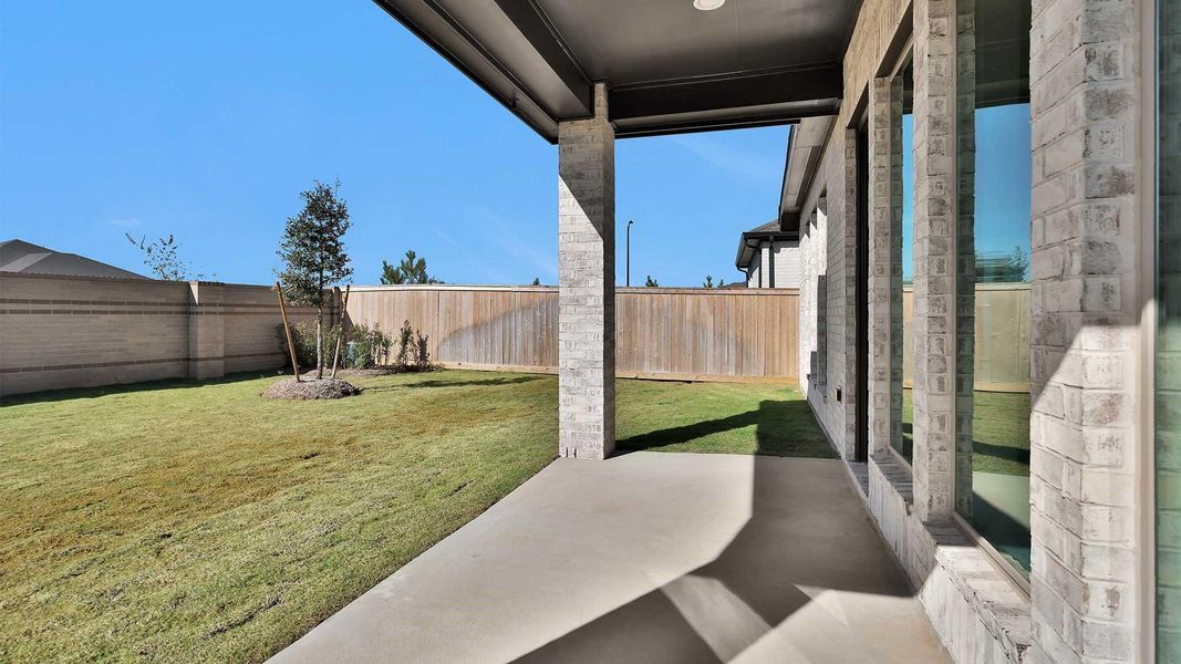 Exterior details and patio area of a home in Bridgeland 45', Cypress (Image 2).