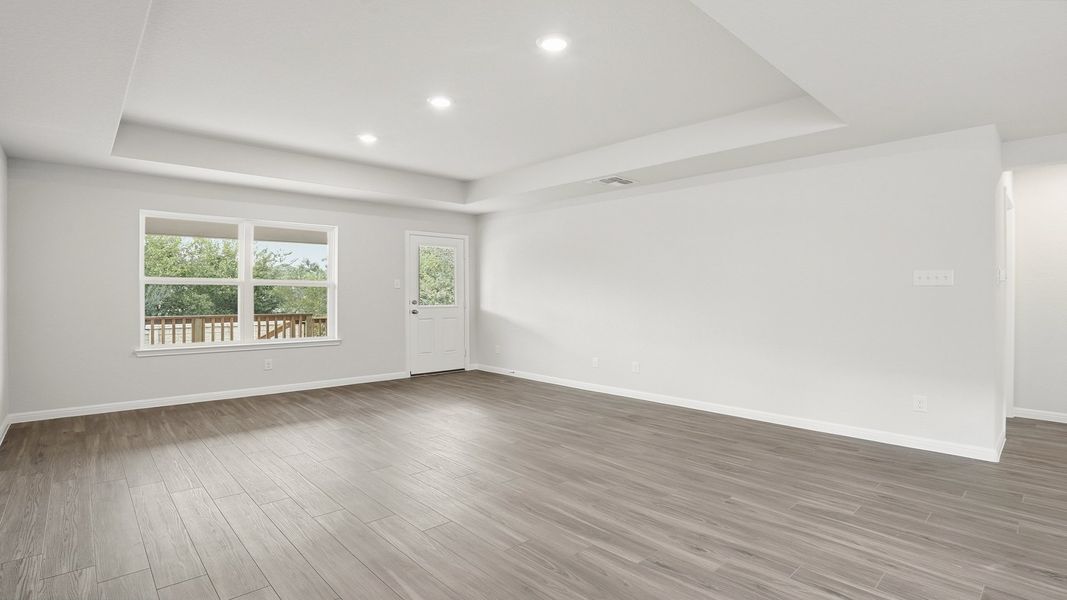 Spacious, unfurnished interior of a new home in Hunters Ranch, San Antonio (Image 18).