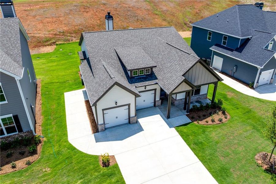 Front exterior of a new home in , Homer, GA, highlighting curb appeal (Image 1). Front exterior of a new home in , Homer, GA, highlighting curb appeal (Image 1).