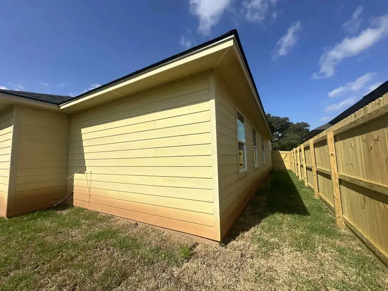 Exterior details and patio area of a home in , Clute (Image 4). Exterior details and patio area of a home in , Clute (Image 4).