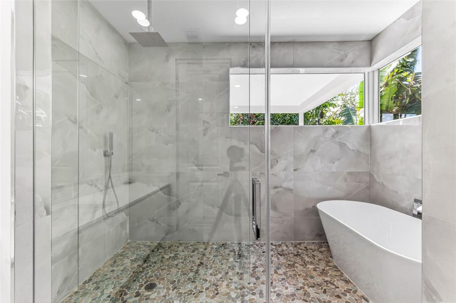 Shower and tub in spacious wet room