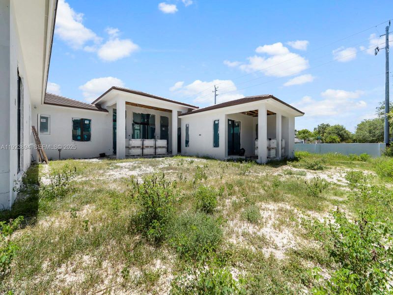 Exterior details and patio area of a home in , Miami (Image 8). Exterior details and patio area of a home in , Miami (Image 8).