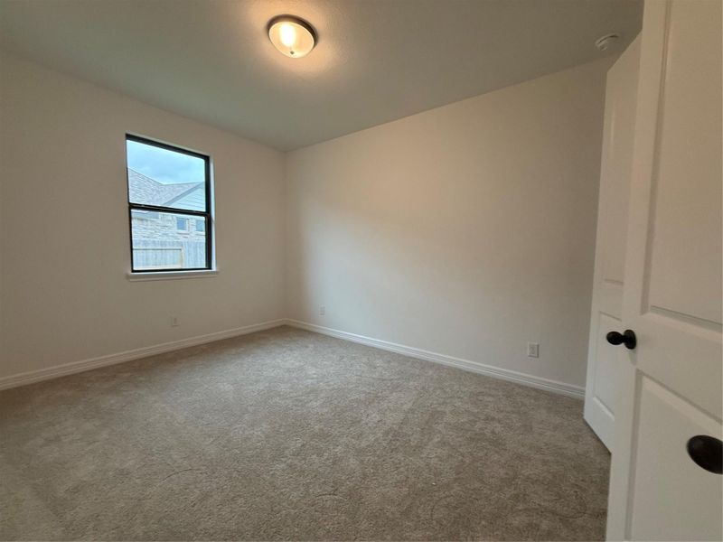 Spacious, unfurnished interior of a new home in Brookewater, Rosenberg (Image 8).