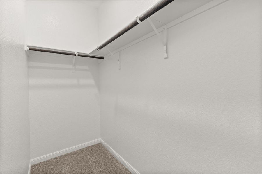 Walk-in Closet in Primary Bedroom - Representative Photo