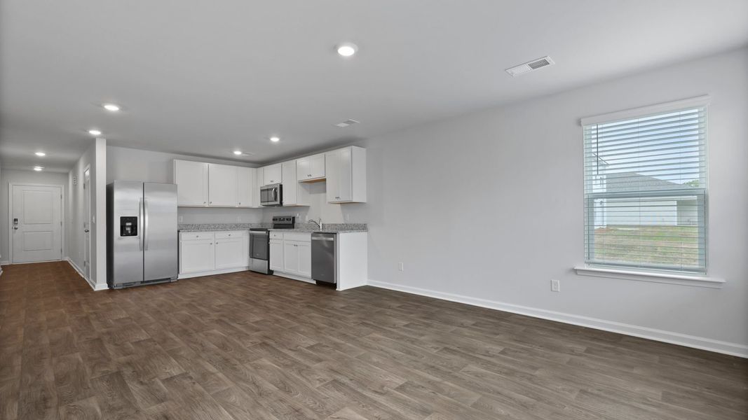 Representative unfurnished interior of a home built from the SULLIVAN by D.R. Horton in Center Pointe, Santee (Image 10).
