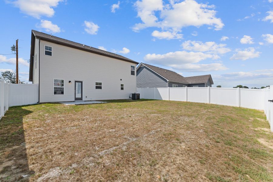 Front exterior of a new home in Stonehenge, Manchester, TN, highlighting curb appeal (Image 16). Front exterior of a new home in Stonehenge, Manchester, TN, highlighting curb appeal (Image 16).