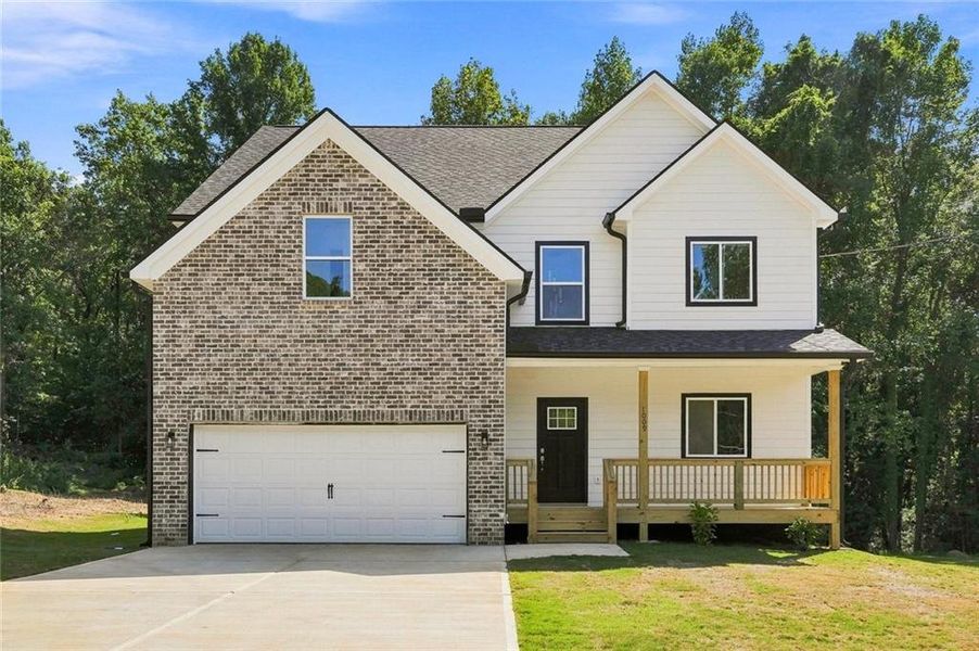 Front exterior of a new home in , Austell, GA, highlighting curb appeal (Image 1). Front exterior of a new home in , Austell, GA, highlighting curb appeal (Image 1).