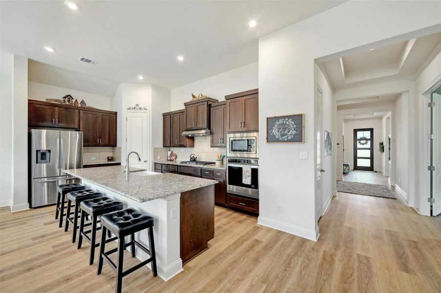 Furnished interior view inside a new home in , San Marcos (Image 30).