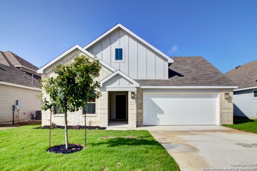 Front exterior of a new home in Prairie Green, Converse, TX, highlighting curb appeal (Image 1). Front exterior of a new home in Prairie Green, Converse, TX, highlighting curb appeal (Image 1).