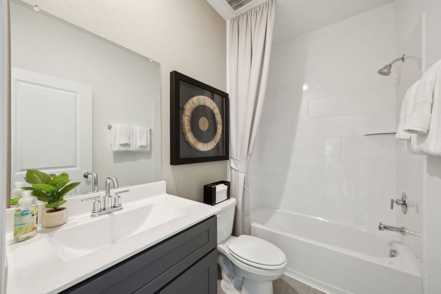 Representative furnished interior of a home built from the Coolidge by Centex in Windcress, Cove (Image 17).