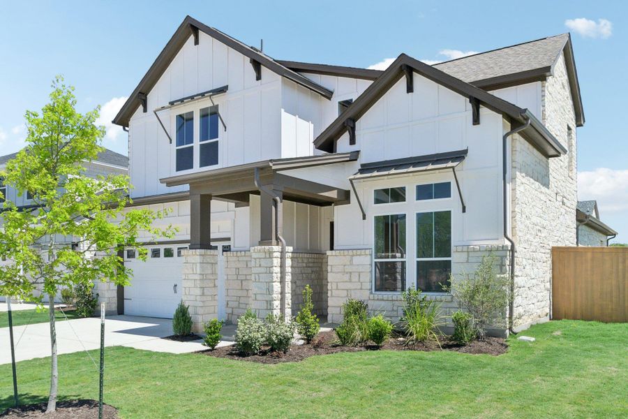 Front exterior of a new home in Persimmon, Buda, TX, highlighting curb appeal (Image 19).