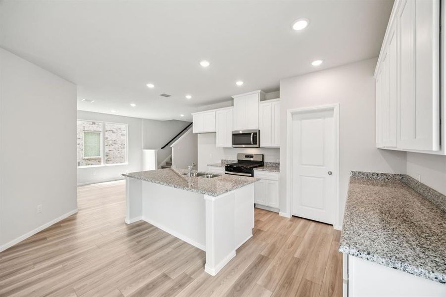 Furnished interior view inside a new home in AnaCapri, Anna (Image 4). Furnished interior view inside a new home in AnaCapri, Anna (Image 4).