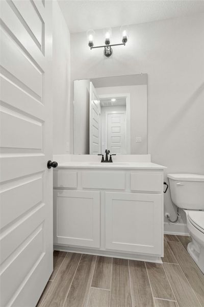 Furnished interior view inside a new home in The Woodlands Hills – 55', Willis (Image 10).