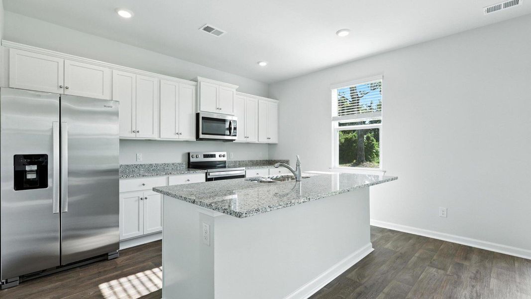 Furnished interior view inside a new home in The Ranch, Holly Hill (Image 5).