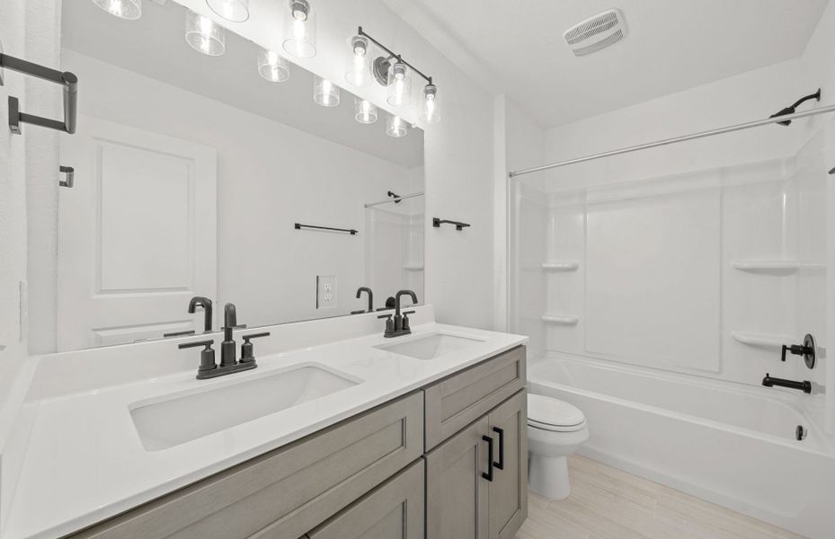 Furnished interior view inside a new home in Crosswinds, Kyle (Image 6).