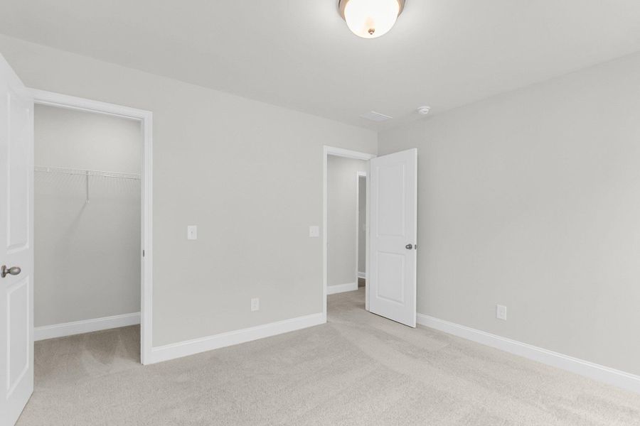 Spacious, unfurnished interior of a new home in Sweetgrass Station, Summerville (Image 20).