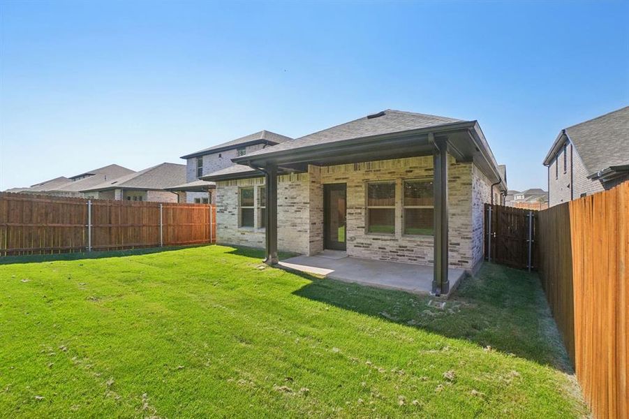 Exterior details and patio area of a home in Eastridge - Spring Series, McKinney (Image 21). Exterior details and patio area of a home in Eastridge - Spring Series, McKinney (Image 21).