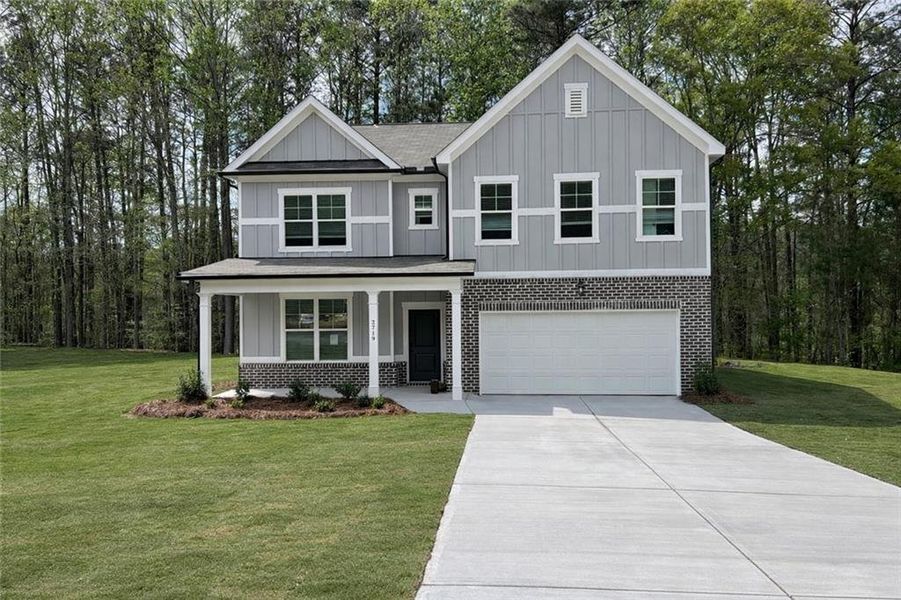 Front exterior of a new home in Whisper Creek, Atlanta, GA, highlighting curb appeal (Image 21).