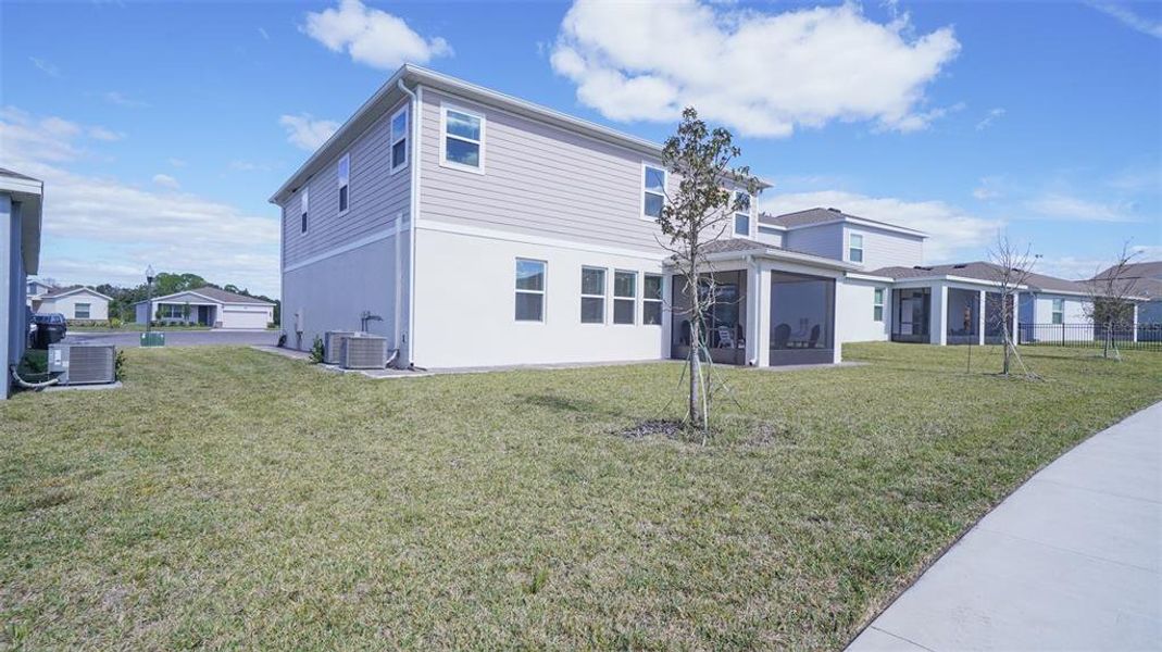 Front exterior of a new home in Providence, Davenport, FL, highlighting curb appeal (Image 24). Front exterior of a new home in Providence, Davenport, FL, highlighting curb appeal (Image 24).