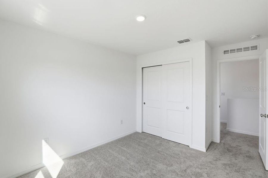 Spacious, unfurnished interior of a new home in Waterstone, Groveland (Image 42). Spacious, unfurnished interior of a new home in Waterstone, Groveland (Image 42).