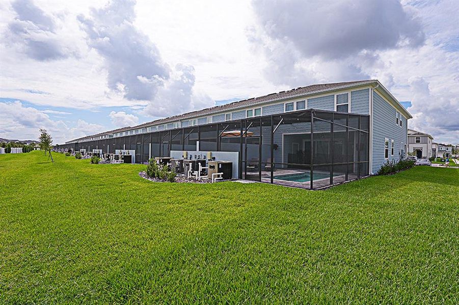 Front exterior of a new home in , Clermont, FL, highlighting curb appeal (Image 27).