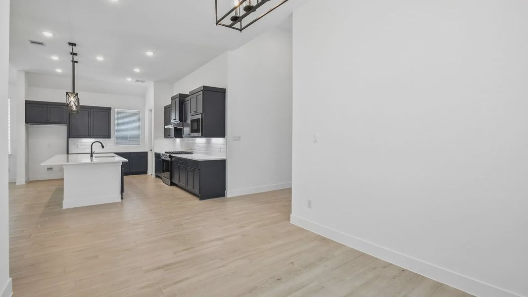 Furnished interior view inside a new home in Artavia, Conroe (Image 6).