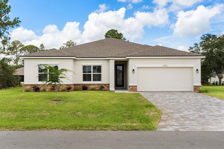 Front exterior of a new home in , Homosassa, FL, highlighting curb appeal (Image 1). Front exterior of a new home in , Homosassa, FL, highlighting curb appeal (Image 1).