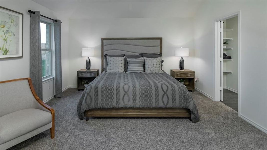 Bedroom with carpet and baseboards