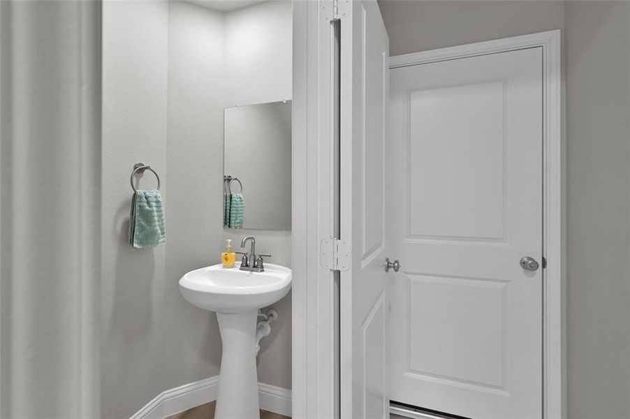 Powder Room Near Garage Entrance