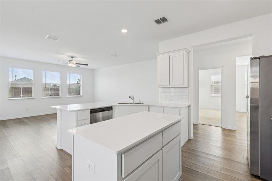 Furnished interior view inside a new home in Linden Hills: Classic Collection, Little Elm (Image 8). Furnished interior view inside a new home in Linden Hills: Classic Collection, Little Elm (Image 8).