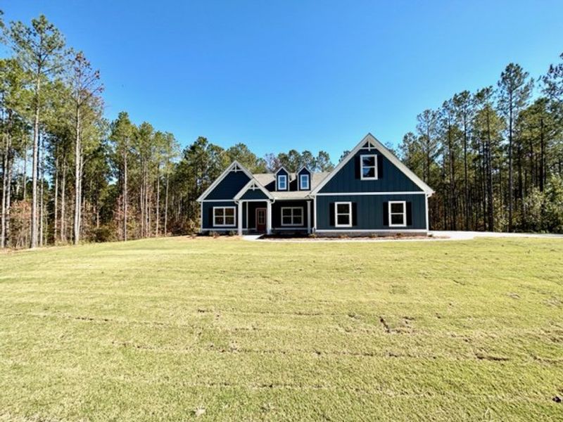 Front exterior of a new home in Triple Park, Moreland, GA, highlighting curb appeal (Image 2). Front exterior of a new home in Triple Park, Moreland, GA, highlighting curb appeal (Image 2).