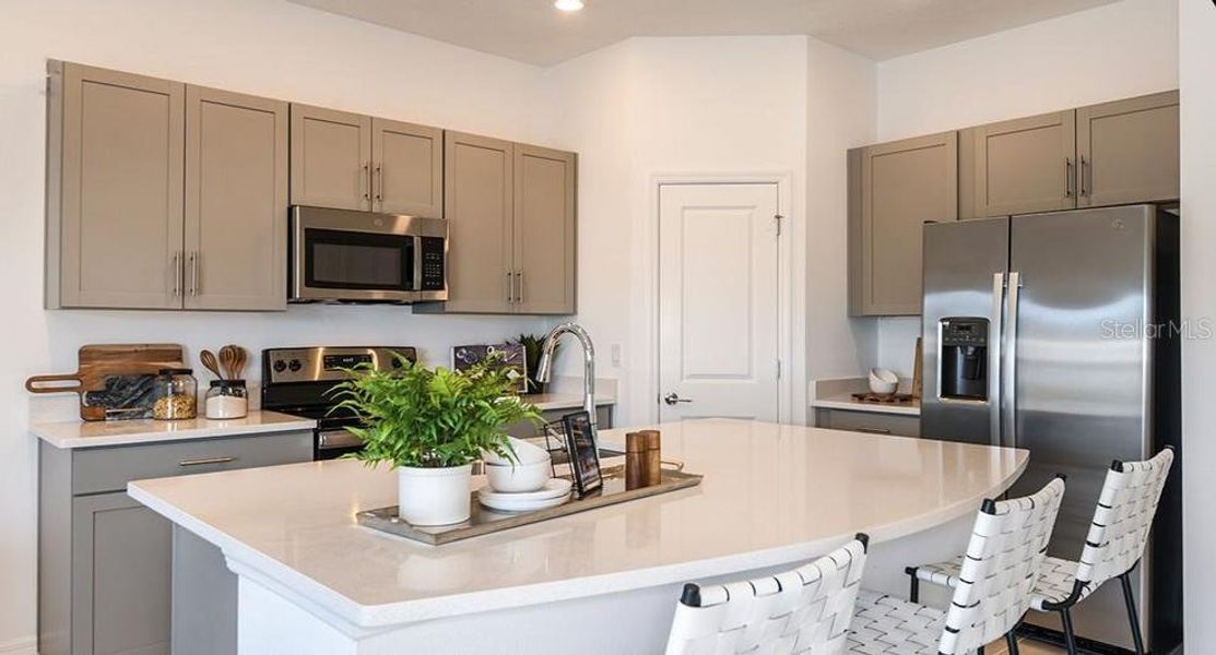 Furnished interior view inside a new home in The Townhomes at Azario Lakewood Ranch, Bradenton (Image 5).