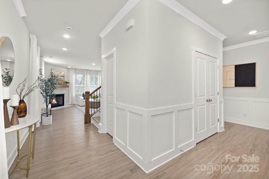 Family Room with gas fireplace and walls of windows adding lots of natural light