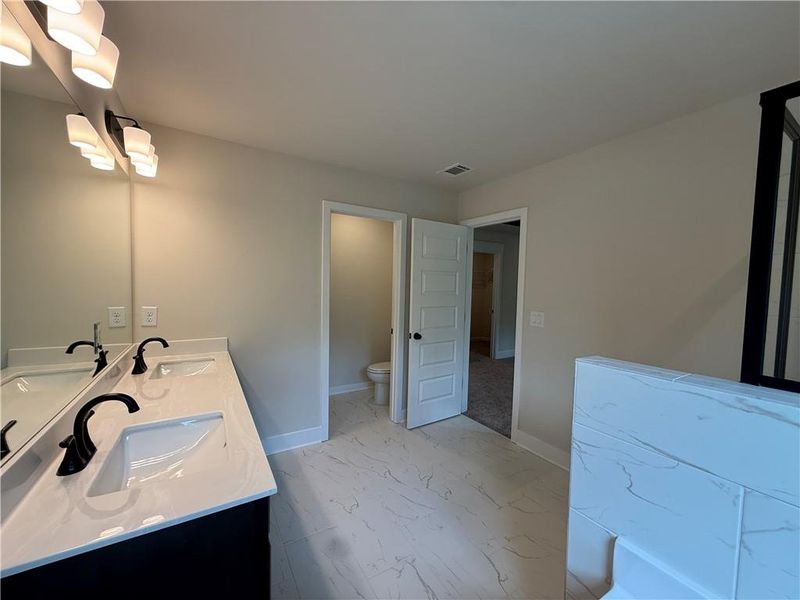 Furnished interior view inside a new home in The Towns at Auburn Station East, Auburn (Image 12).