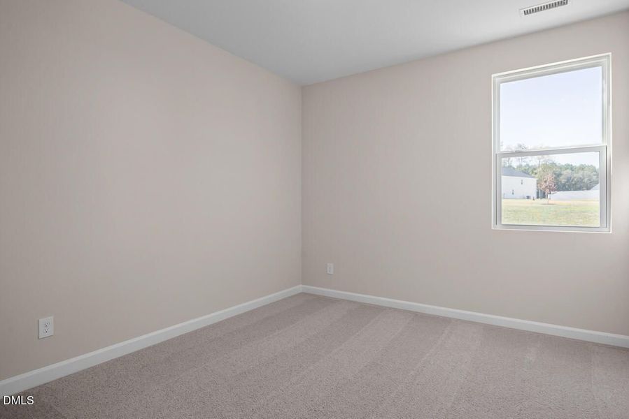Spacious, unfurnished interior of a new home in Wellers Knoll, Lillington (Image 15).