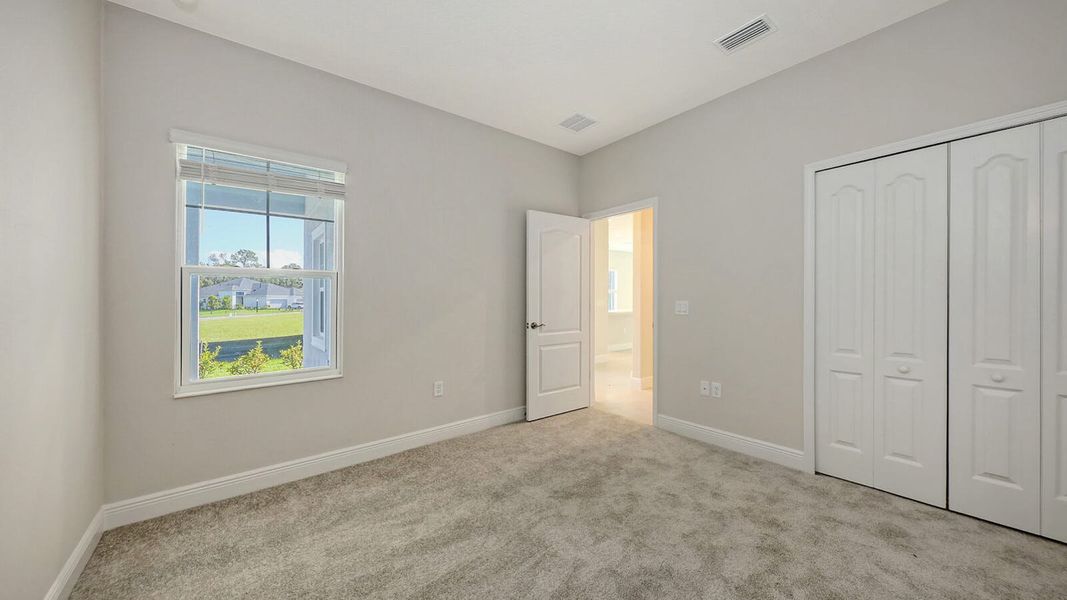 Spacious, unfurnished interior of a new home in Wildleaf Real Estate and Homes for Sale in Parrish, FL - Neal Communities, Parrish (Image 48). Spacious, unfurnished interior of a new home in Wildleaf Real Estate and Homes for Sale in Parrish, FL - Neal Communities, Parrish (Image 48).