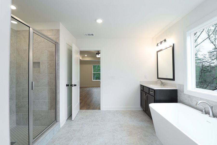 Furnished interior view inside a new home in Woodland Hills, Loganville (Image 9).