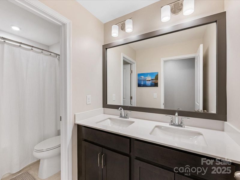 Furnished interior view inside a new home in Towns at Rea Colony, Charlotte (Image 28).