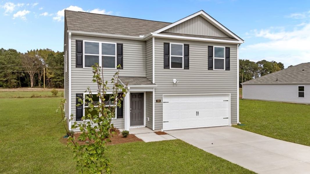 Front exterior of a new home in Madeline Farm, New Bern, NC, highlighting curb appeal (Image 17).