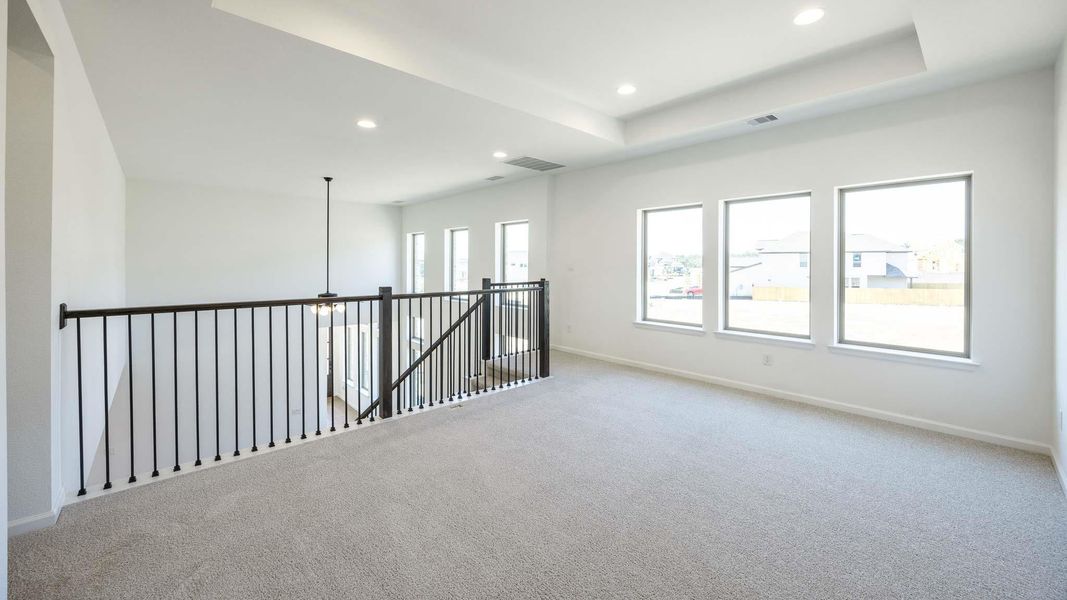Spacious, unfurnished interior of a new home in Santa Rita Ranch - Tierra Rosa, Liberty Hill (Image 9).