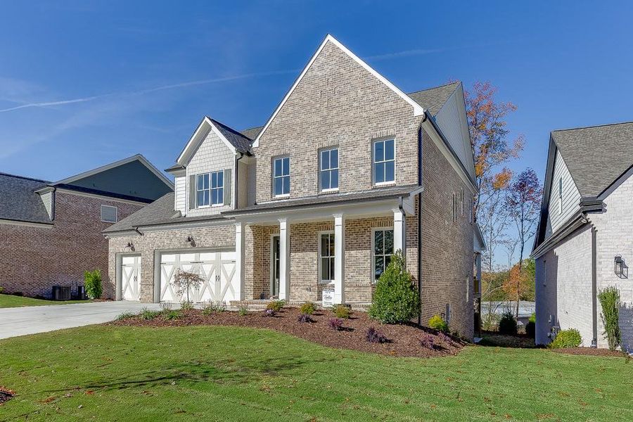 Front exterior of a new home in , Buford, GA, highlighting curb appeal (Image 1).