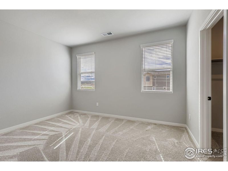 bedroom 3 with walk in closet