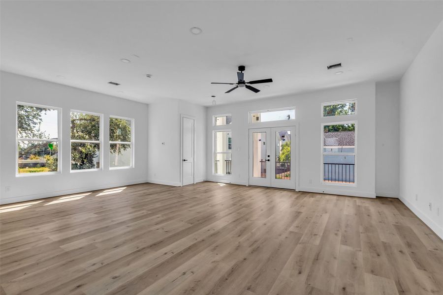 Bright and airy, this spacious livingroom is filled with natural lightstreaming through large glasswindows, creating a warm andinviting atmosphere. Bright and airy, this spacious livingroom is filled with natural lightstreaming through large glasswindows, creating a warm andinviting atmosphere.