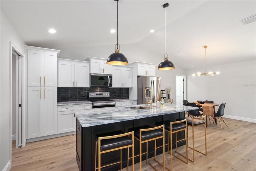 Furnished interior view inside a new home in , Dunnellon (Image 26).