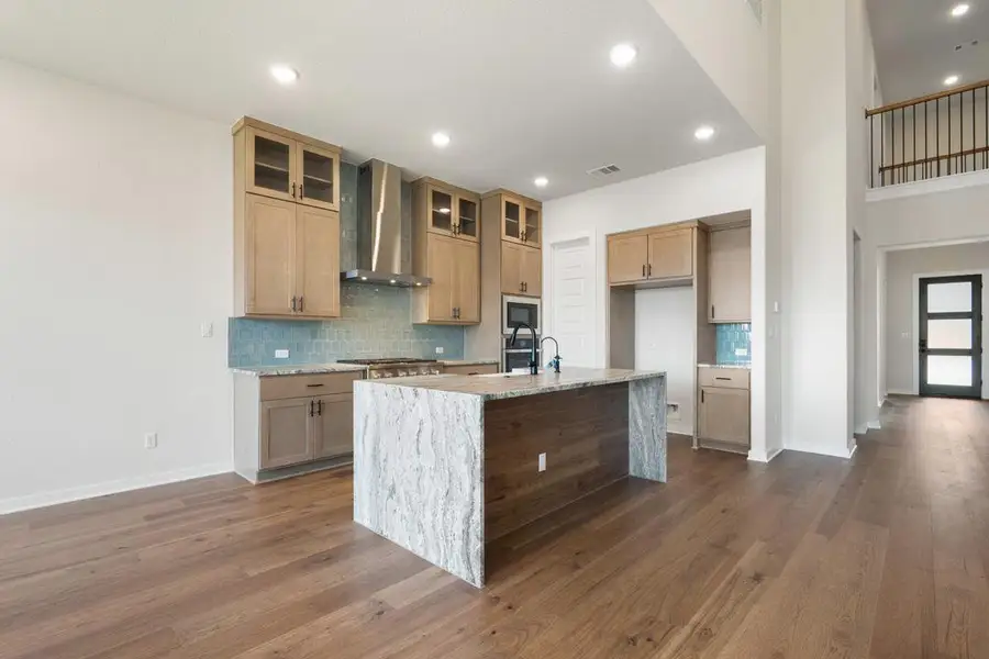 Furnished interior view inside a new home in Park Collection at Heritage, Dripping Springs (Image 10). Furnished interior view inside a new home in Park Collection at Heritage, Dripping Springs (Image 10).