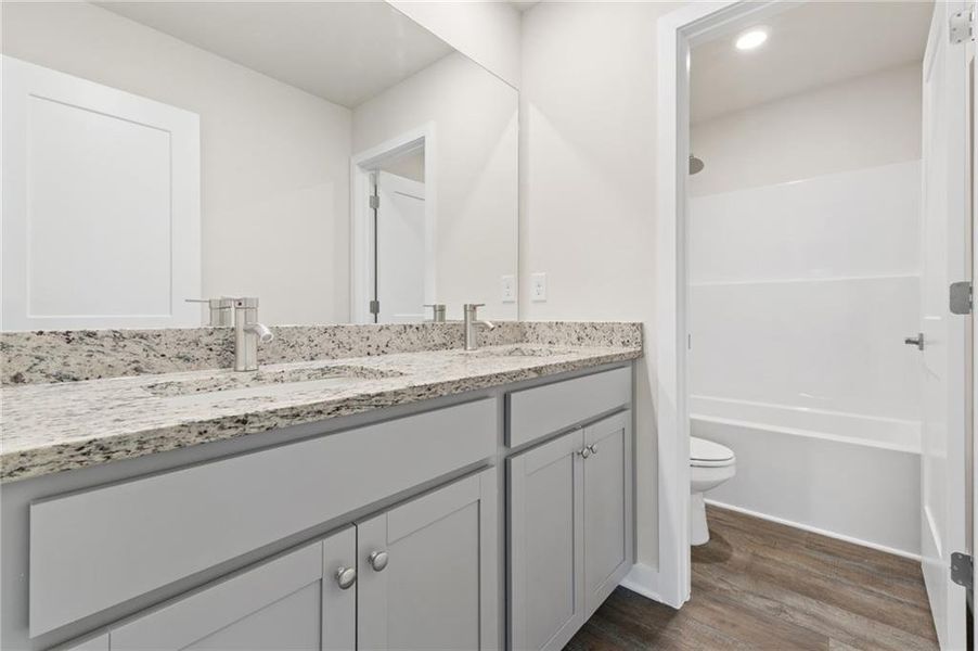 Furnished interior view inside a new home in Fern Dale, Fairburn (Image 8).