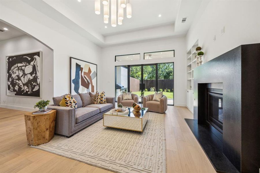 Main living area with great views of the backyard, gas starter fireplace and builtins. Main living area with great views of the backyard, gas starter fireplace and builtins.