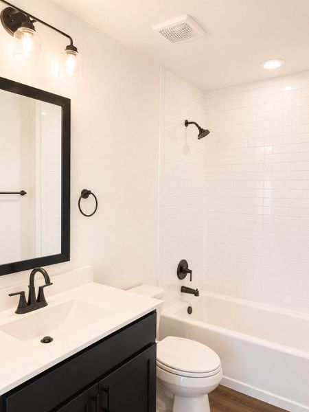 Modern bathroom featuring sleek black matte fixtures, stylish finishes, bright lighting, and a clean contemporary design. Modern bathroom featuring sleek black matte fixtures, stylish finishes, bright lighting, and a clean contemporary design.