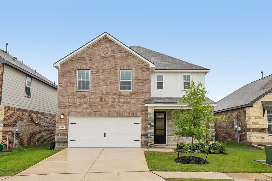 Front exterior of a new home in Hightop Ridge, Converse, TX, highlighting curb appeal (Image 21).