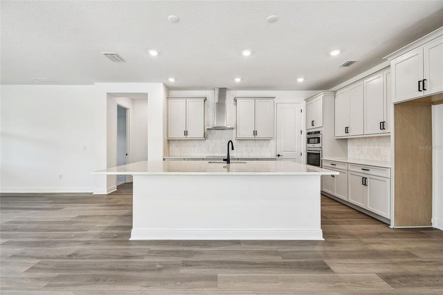 Furnished interior view inside a new home in Creeks Edge at Twin Rivers, Parrish (Image 12).